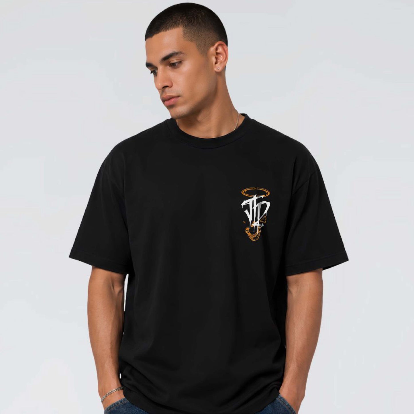 Afterform black heavy graphic T-shirt worn with white JTD insignia, orange halo and skeletal chest detail