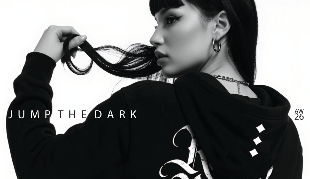 Jump The Dark London Banner image of a Model wearing the Raised Below Heavyweight hoodie which is part of the new Autumn/Winter release.