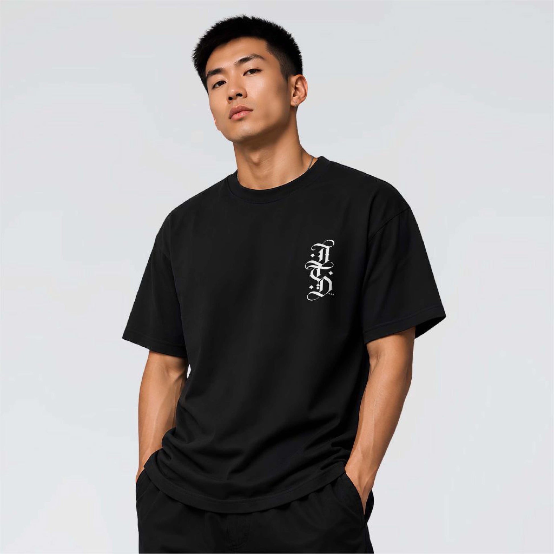 The Blackletter black heavyweight graphic T-shirt with white JTD gothic chest print