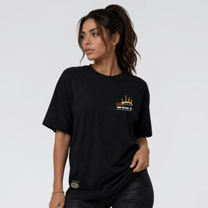 Female model wearing Broken Saint black graphic t-shirt by Jump The Dark UK