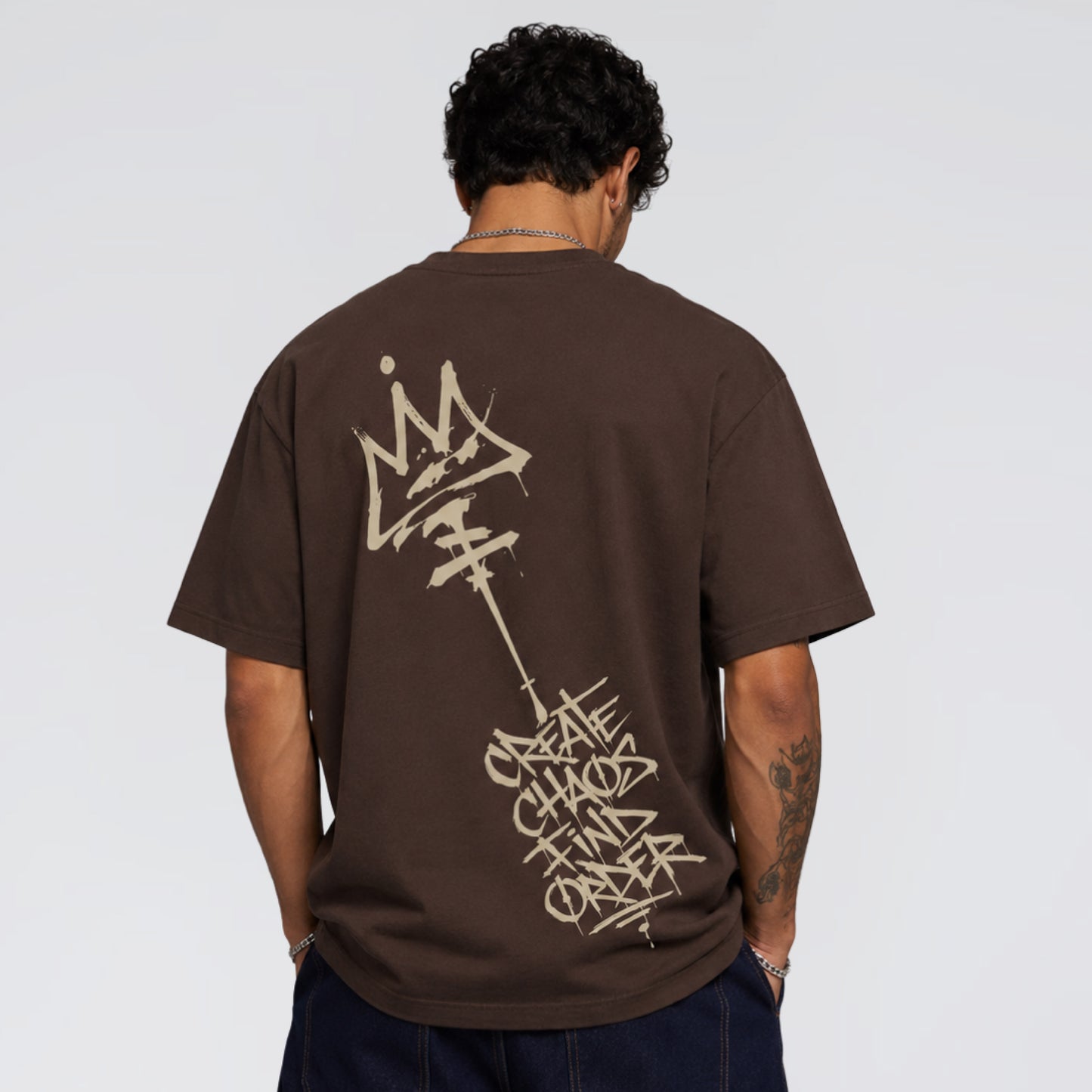 Jump The Dark Back print of Chaos and Order brown streetwear t-shirt.