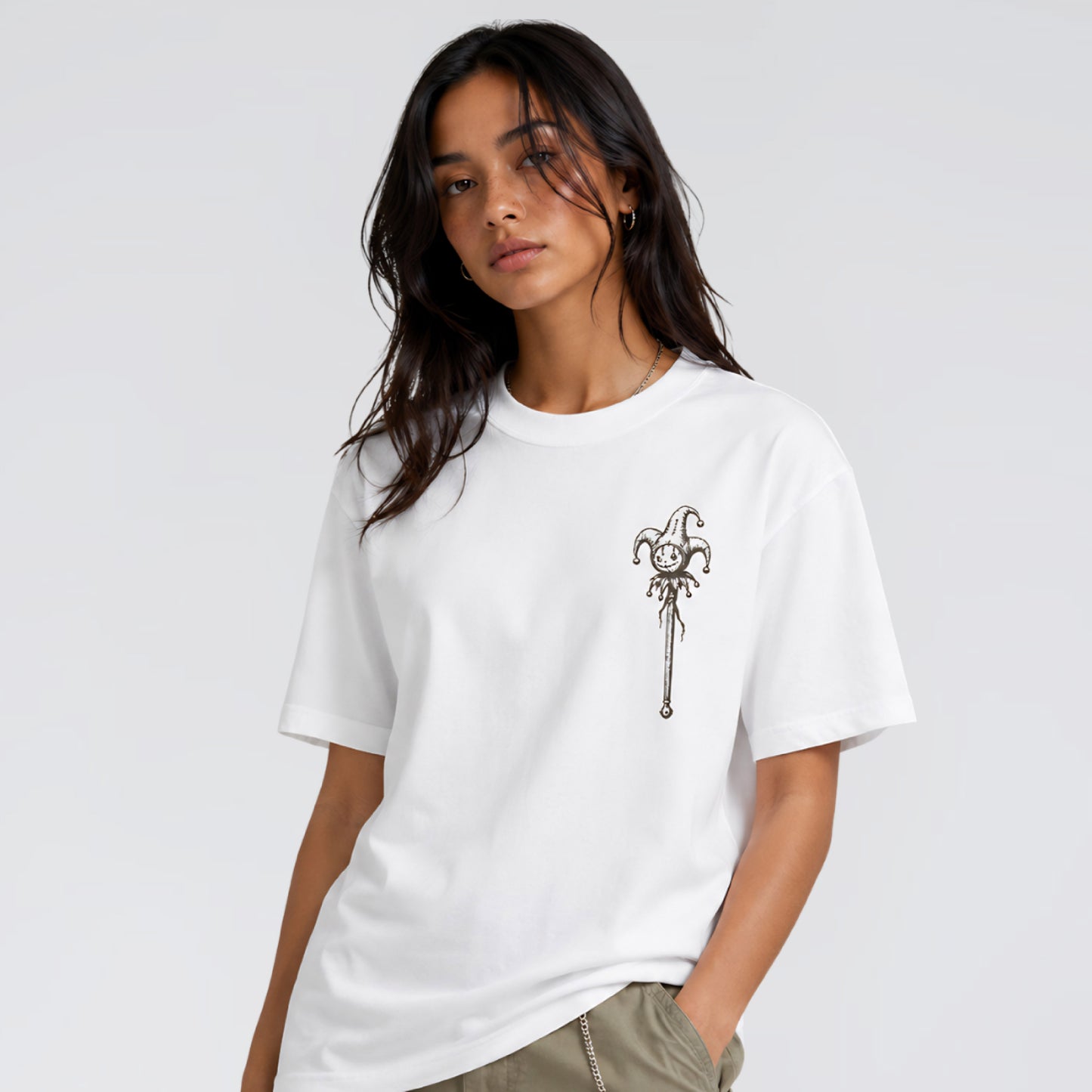 Female model wearing Midnight Jester white graphic t-shirt.