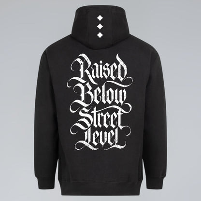 Black gothic graphic hoodie with Raised Below Street Level blackletter back print and diamond hood design