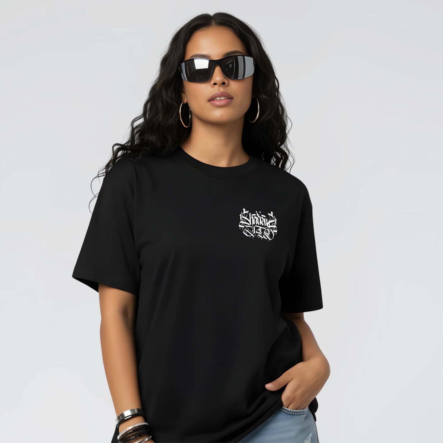Black Graphic Streetwear Urban Tee with white print on pocket, 180 GSM Unisex Style. 