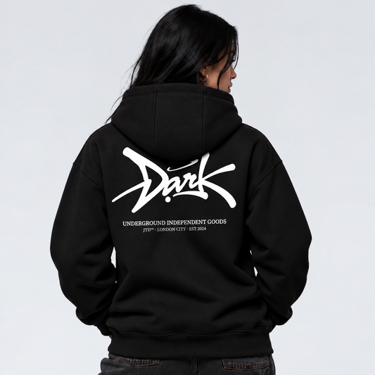Signature black graphic hoodie on female model with oversized Jump the Dark back print