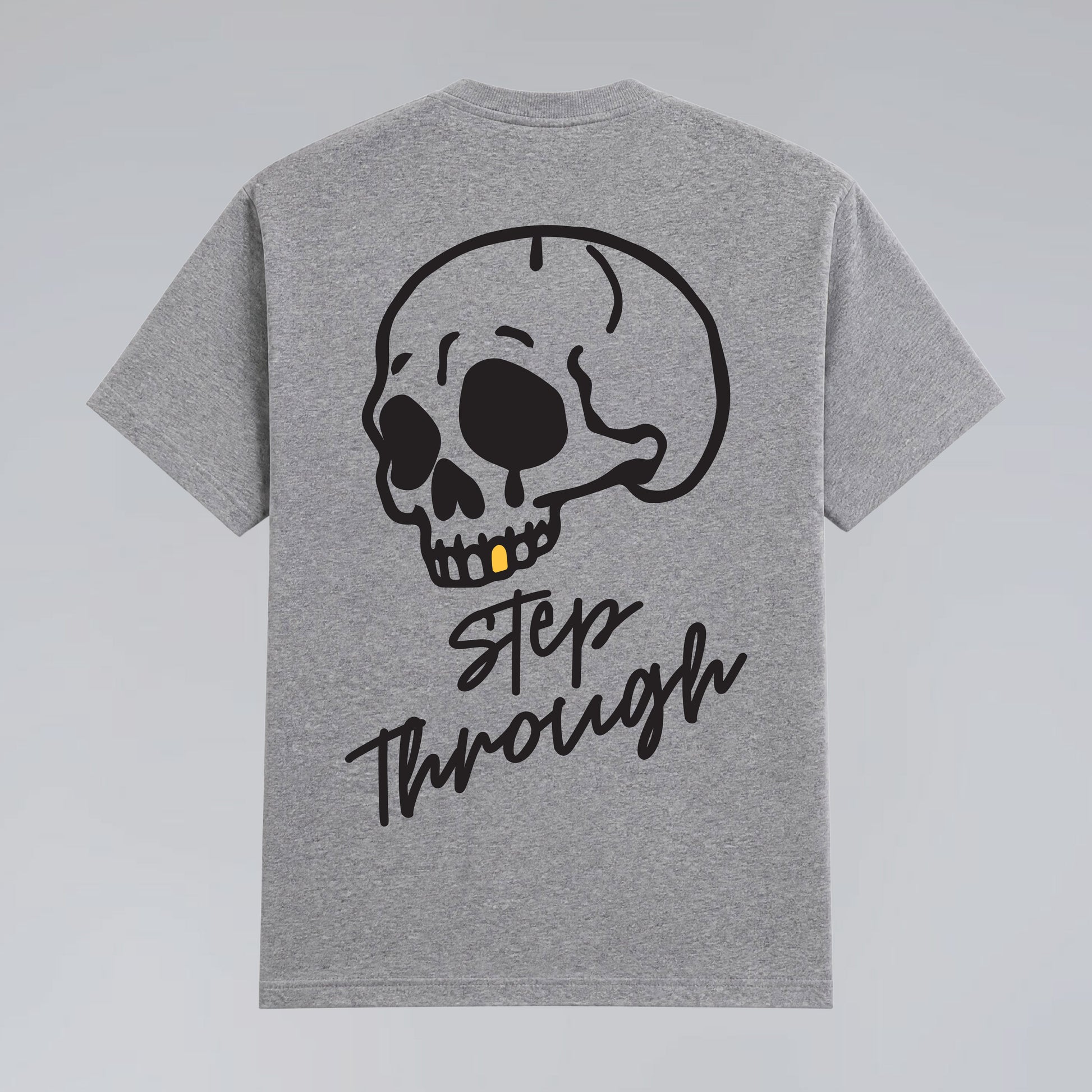 Back flat lay of heather grey Jump the Dark Step Through t-shirt with oversized skull graphic