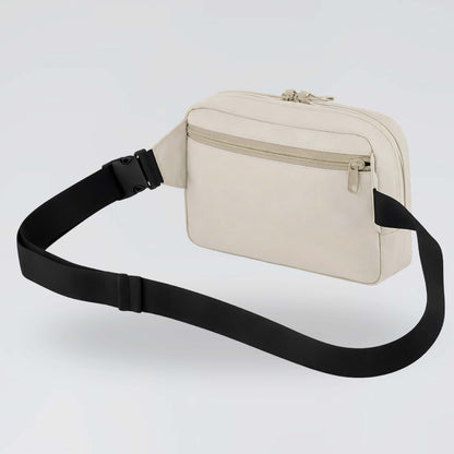 Natural stone Jump the Dark waist bag rear view with zipped pocket and black strap